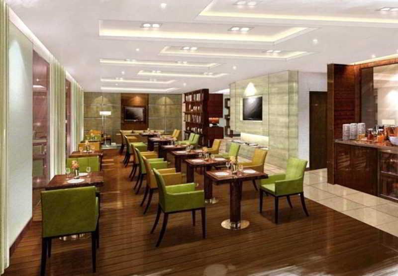 Courtyard By Marriott Kochi Airport Hotel Nedumbassery Restaurante foto The Club Lounge at KLIA